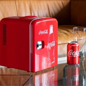 Coca Cola mini fridge.